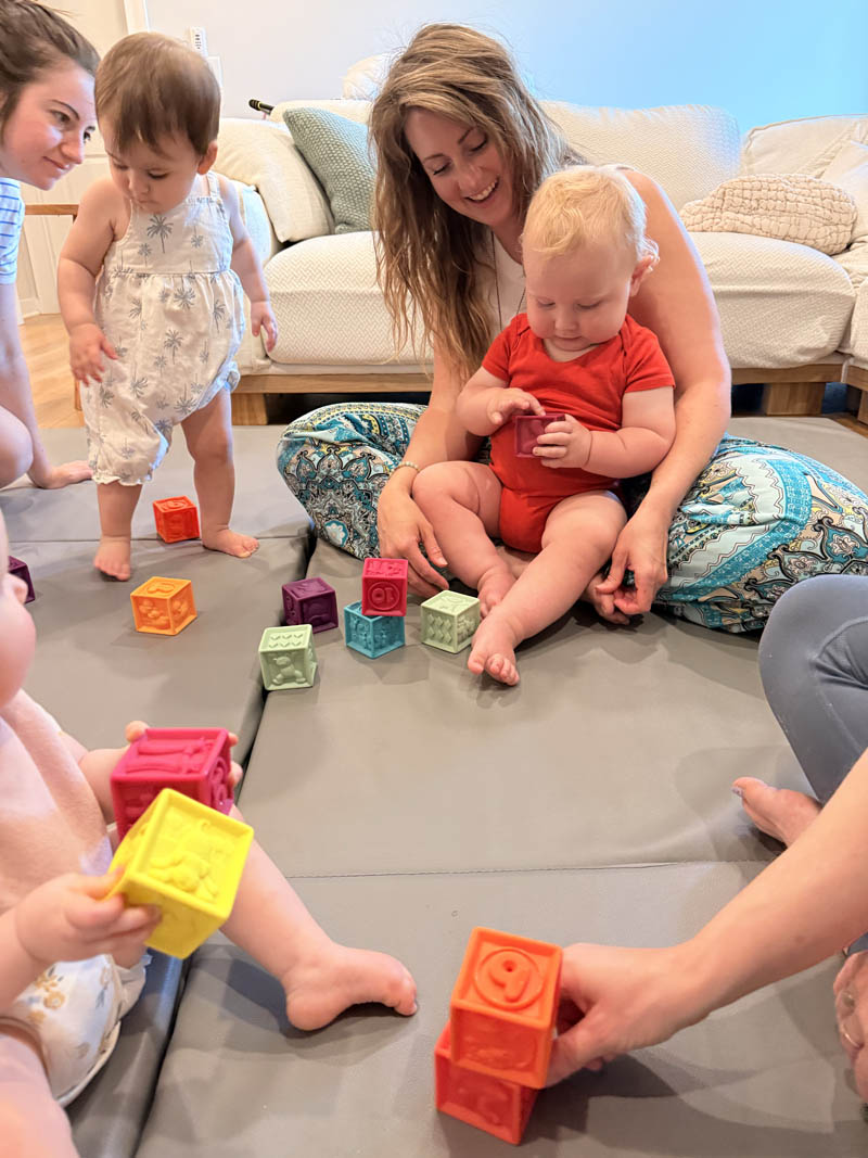 moms with babies and toddlers in class