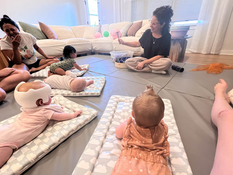 miss lee leading mommy's morning class